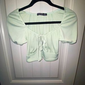 Light green crop top. Size M.
